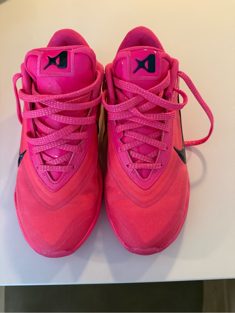 Nike Women’s Bright Pink Athletic Sneakers with Black Swoosh